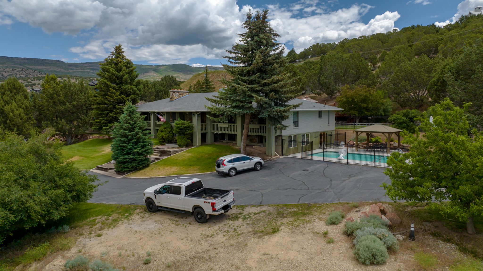 Aerial view of a Heber, Utah home and its lot